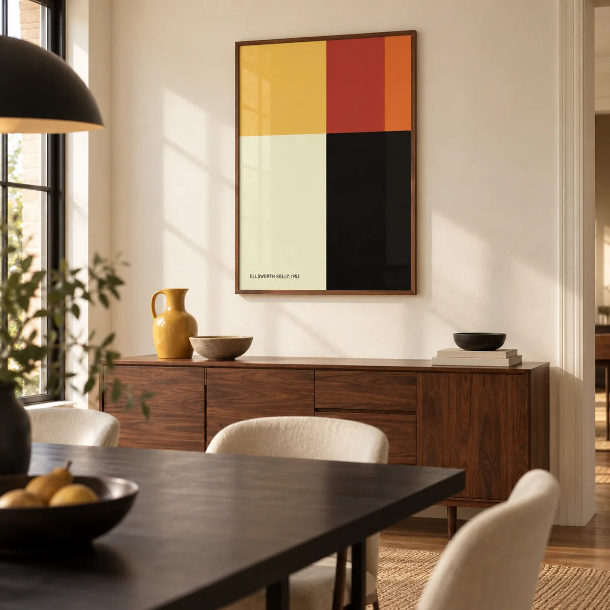 Ellsworth Kelly Poster, framed on the wall of a modern dining room with a warm white wall