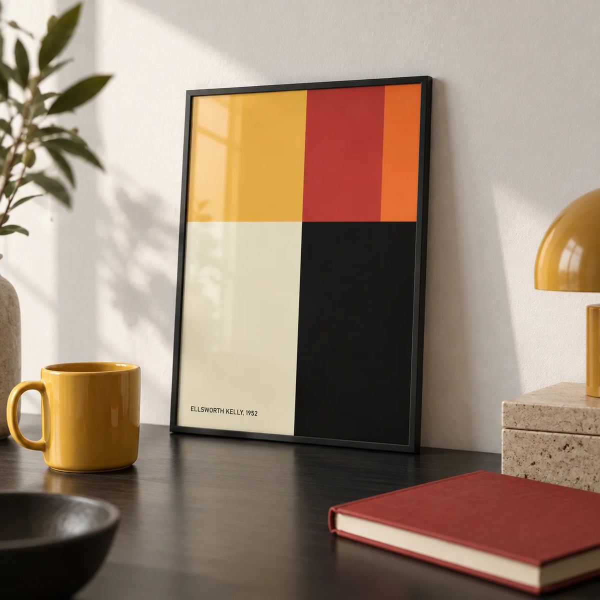 Ellsworth Kelly Poster, a small A4 framed print leaning on a black desk