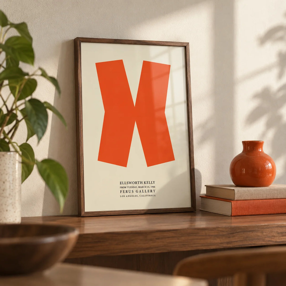 Ellsworth Kelly Print, a small A4 framed print leaning on a walnut shelf in a living room