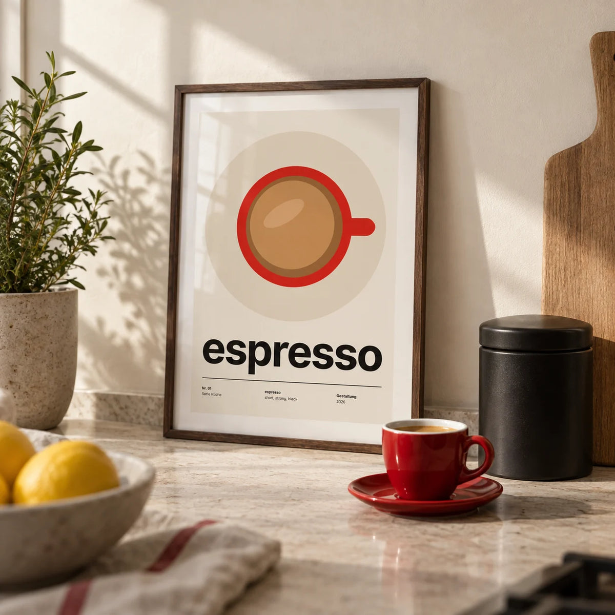 Espresso Cup Print, a small A4 framed print leaning on a pale stone kitchen worktop
