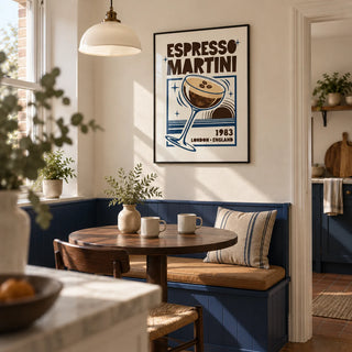 Espresso Martini Print, framed on the wall of a bright kitchen breakfast nook in a small UK terrace with a cream plaster wall and a built-in deep blue bench