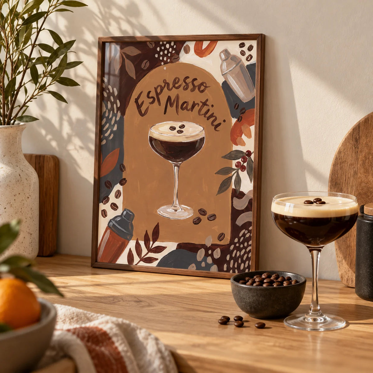 Espresso Martini Wall Art, a small A4 framed print leaning on a pale oak kitchen worktop