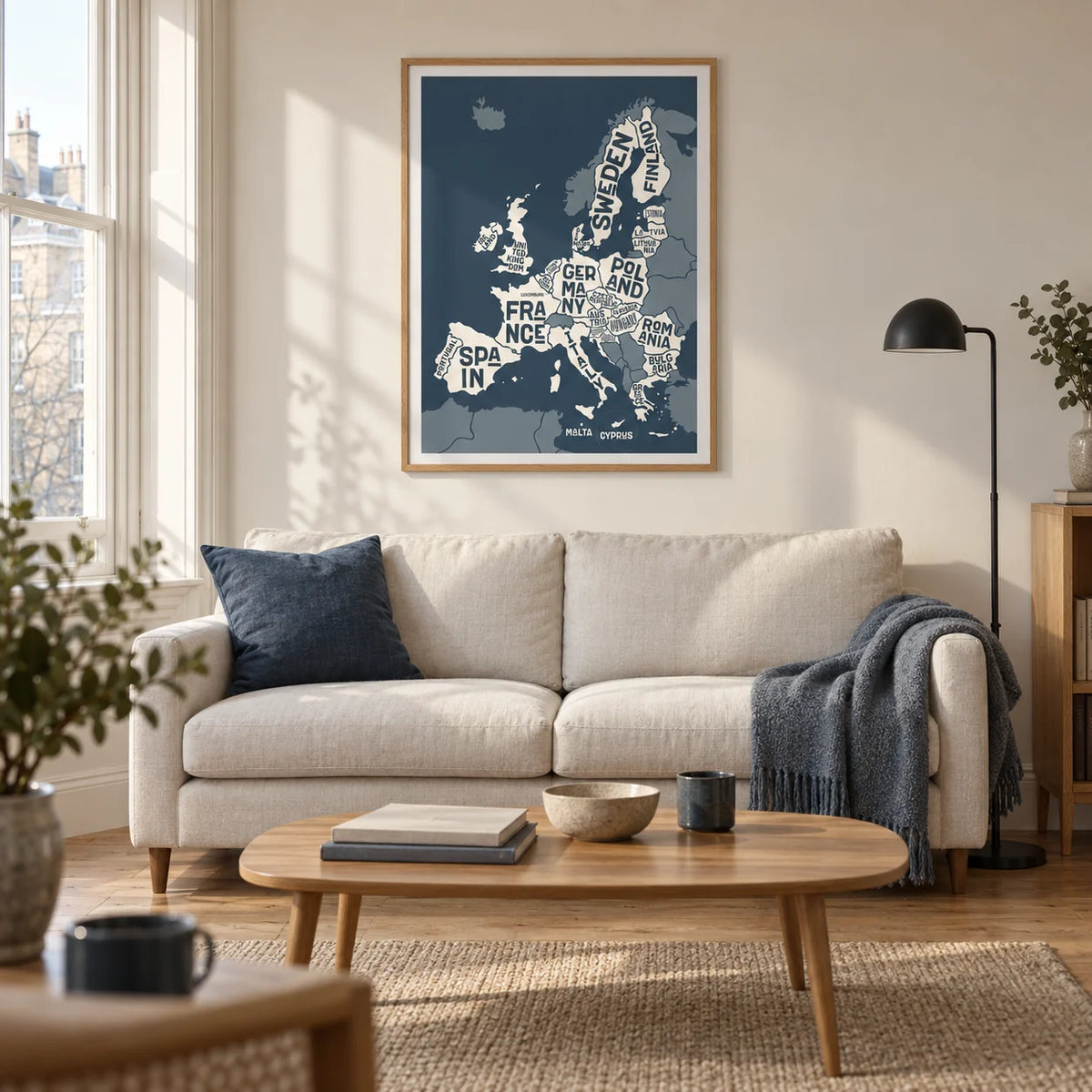 Europe Map Print, framed on the wall of a modern living room in a UK city flat with a warm white wall
