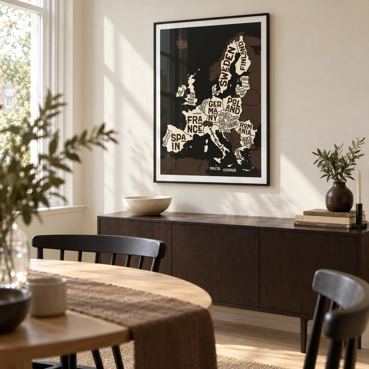 Europe Poster, framed on the wall of a modern dining room in a UK maisonette with a cream wall and pale oak floor