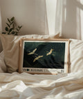 Horizontal nature art print with golden cranes in flight.