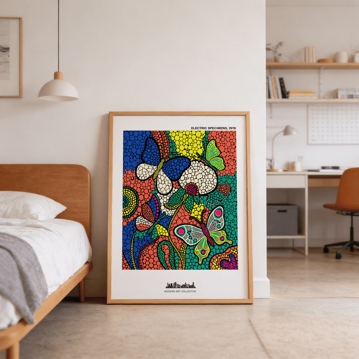 Colorful Butterfly Art Print leaning against a wall next to a wooden bed in a modern bedroom