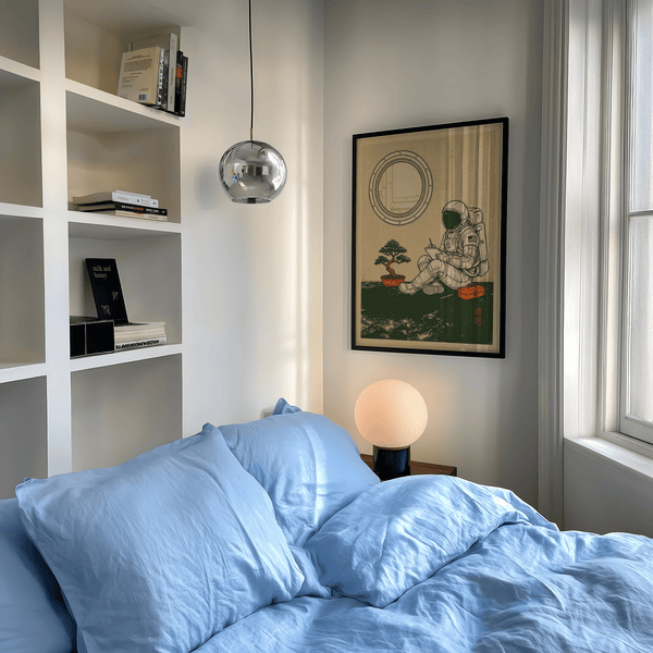 Space Astronaut Art Print featuring astronaut in Green, Beige, and Orange tones for living room