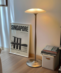 Presenting minimalist Singapore travel poster print with Marina Bay Sands, ArtScience Museum, and water reflection