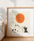 Stylish black and white cats with sun wall art.