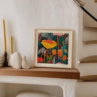 Black backdrop enhancing bright floral prints for framing design