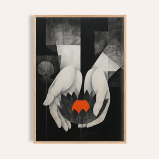 Framed Padma wall art showing hands holding a lotus flower in black white and bright orange