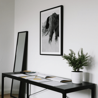 Monochrome elephant head and shoulders poster featuring trunk and tusks
