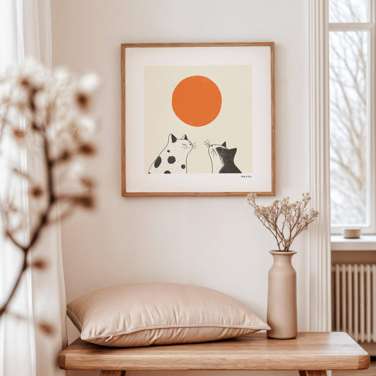 Adorable cats gazing at orange sun in minimalist orange cat art