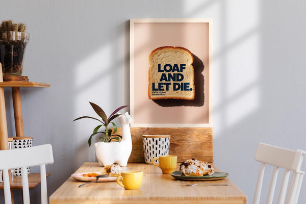 Quirky kitchen art featuring toast on a blush pink background with humorous typography.