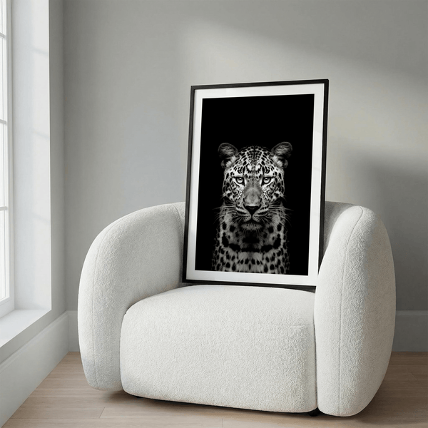 Centered leopard portrait wall art print in black and white with dark background