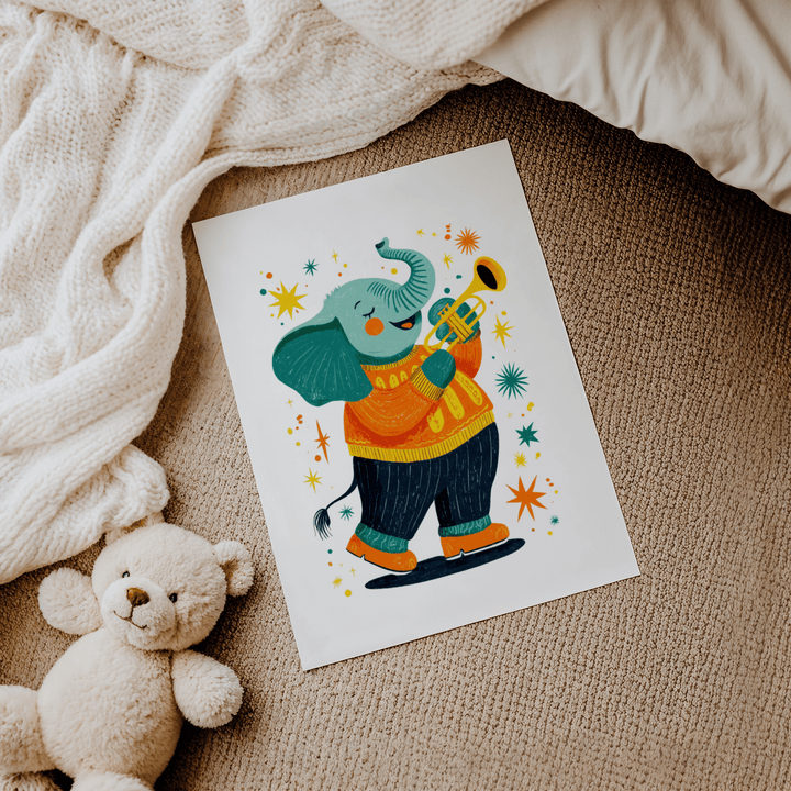Print of Musical Animal Poster with an elephant in an orange sweater on a textured beige surface next to a teddy bear