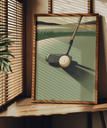 Graphic golf poster featuring a putter head, dimpled ball, and strong diagonal shadow