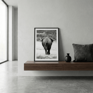 Documentary-style elephant wall art print with soft brush background