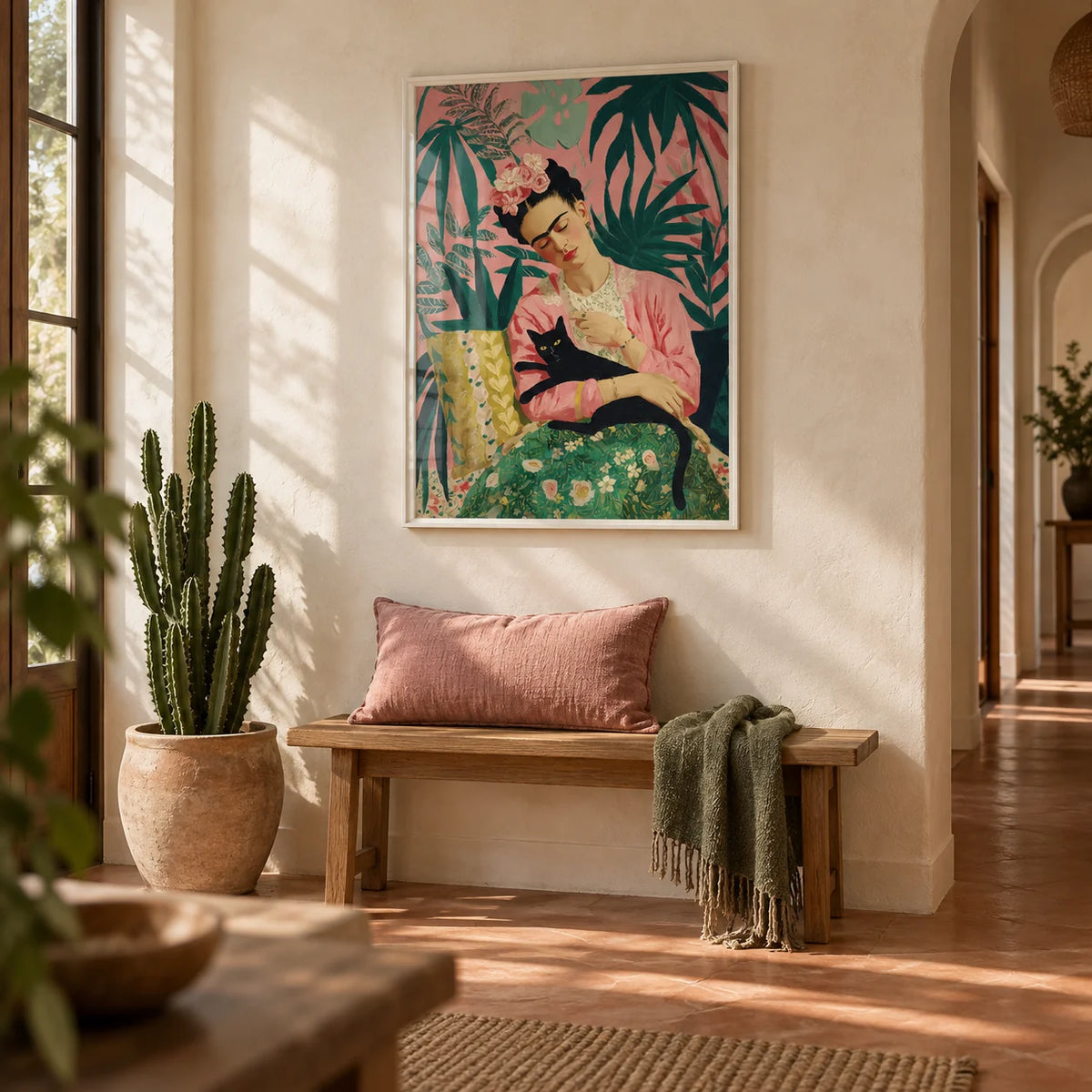 Famous Mexican Painting, framed on the wall of a bright hallway with a limewashed cream wall and a plain terracotta floor