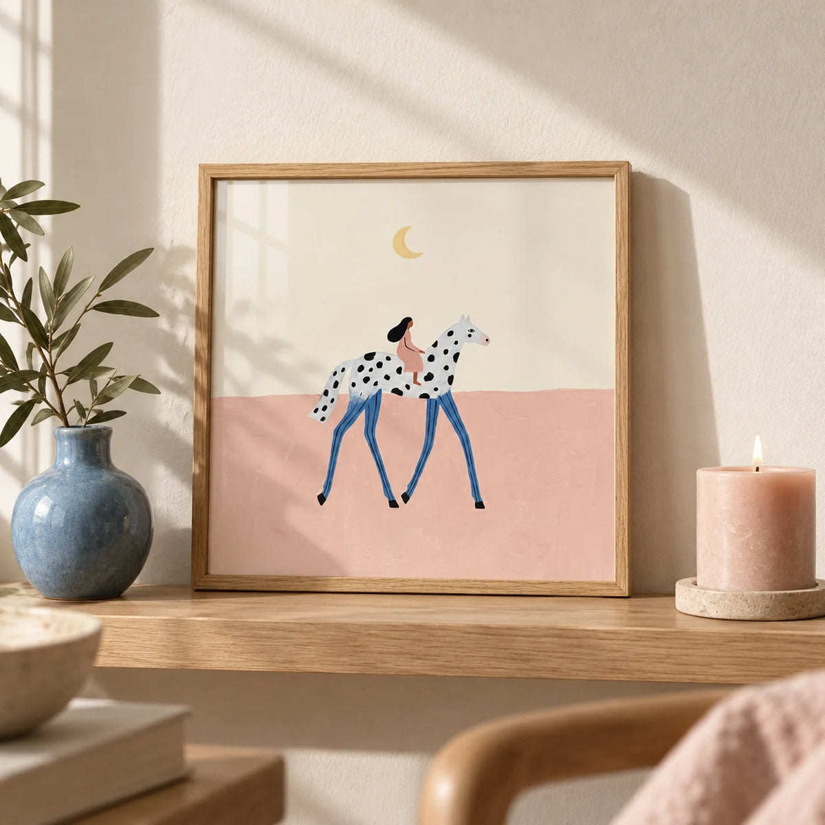 Fantasy Horse Art Print, a small A4 framed print leaning on a pale oak shelf in a living room