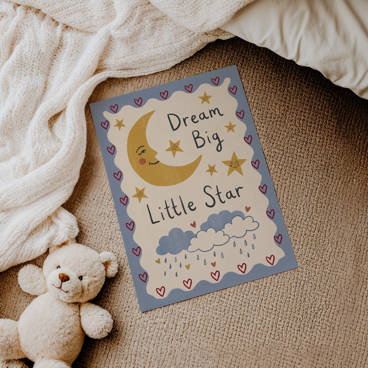 Hand-drawn nursery print of moon face with raindrop clouds