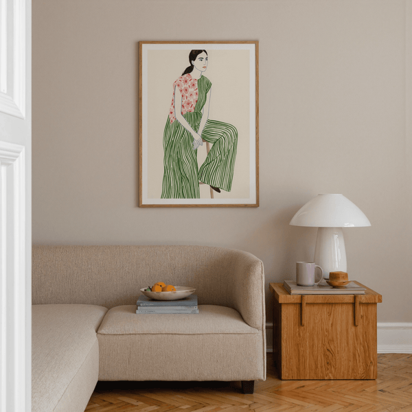 Minimalist seated woman poster wearing green stripes and pink florals