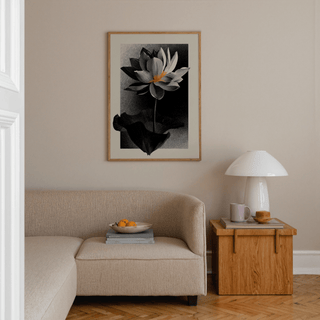Graphic lotus bloom art piece with orange center on dark field
