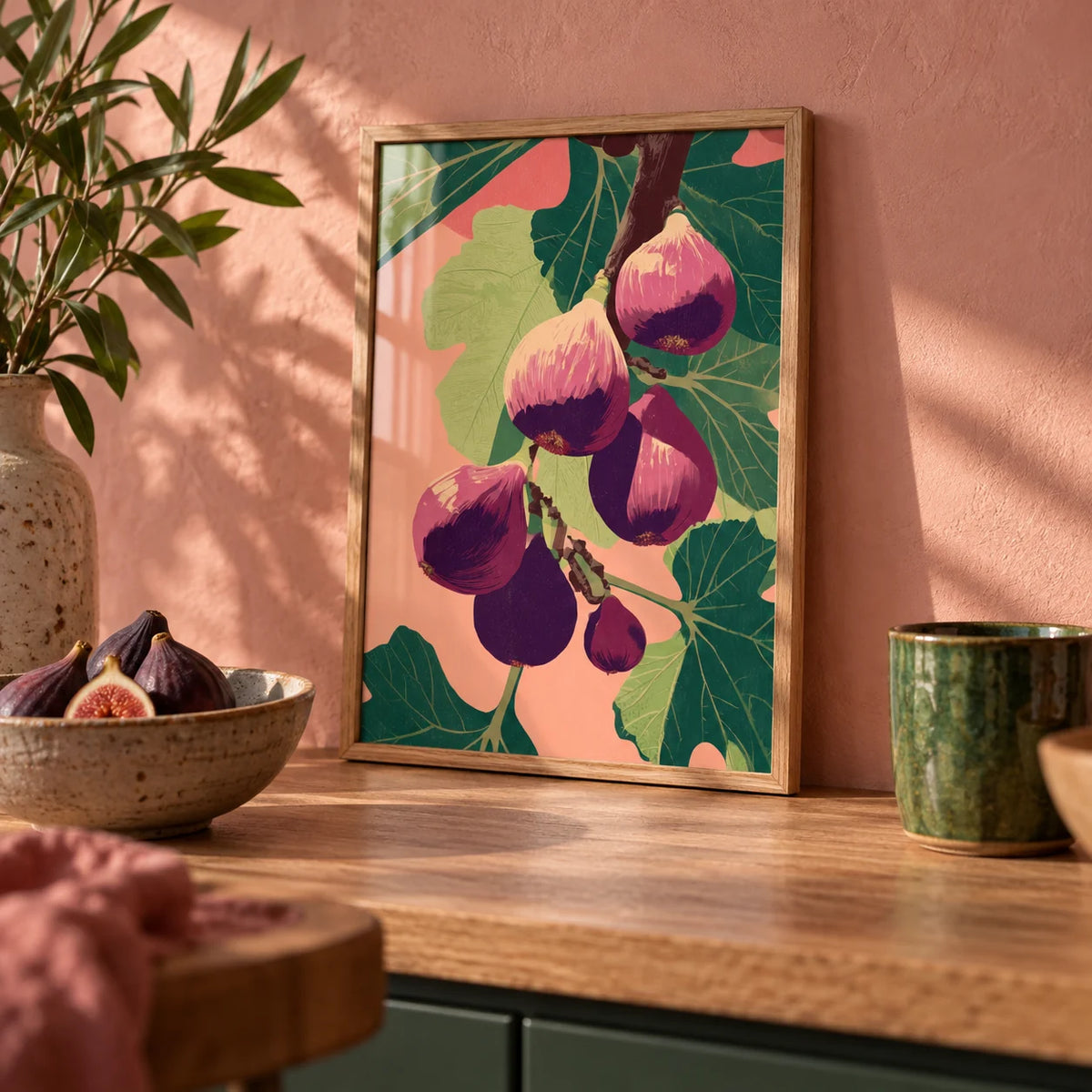 Fig Wall Art, a small A4 framed print leaning on an oak worktop in a kitchen
