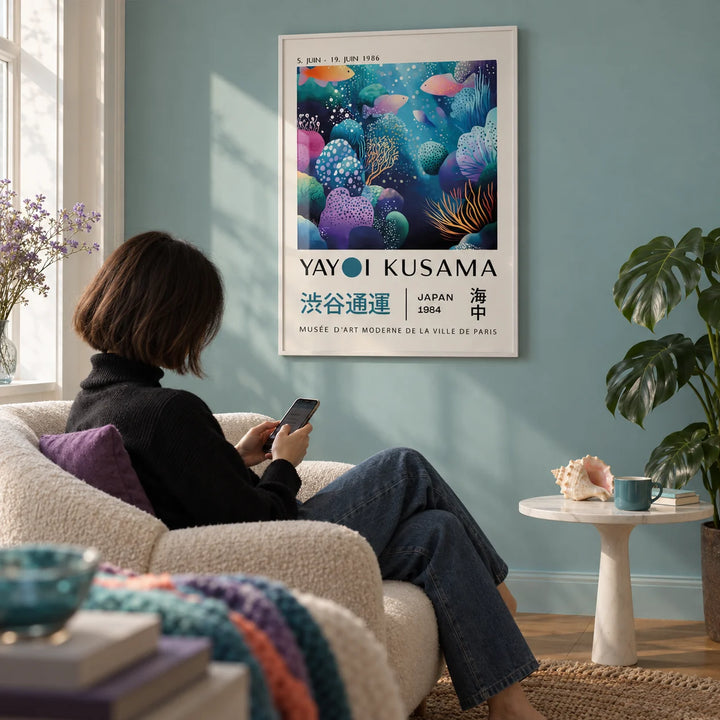 Fish Artwork Prints, framed on the wall of a reading nook with a pale teal wall in a living room