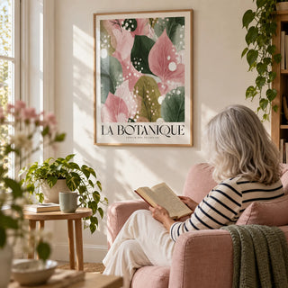 Floral Abstract Print, framed on the wall of a reading corner with a warm white wall in a living room