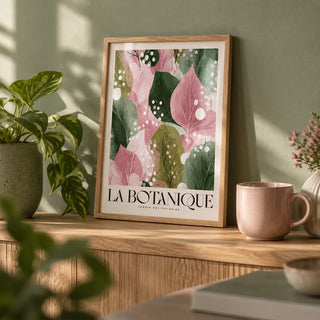 Floral Abstract Print, a small A4 framed print leaning on an oak shelf in a living room