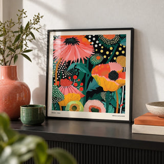 Floral Wall Hanging, a small A4 framed print leaning on a black shelf in a living room