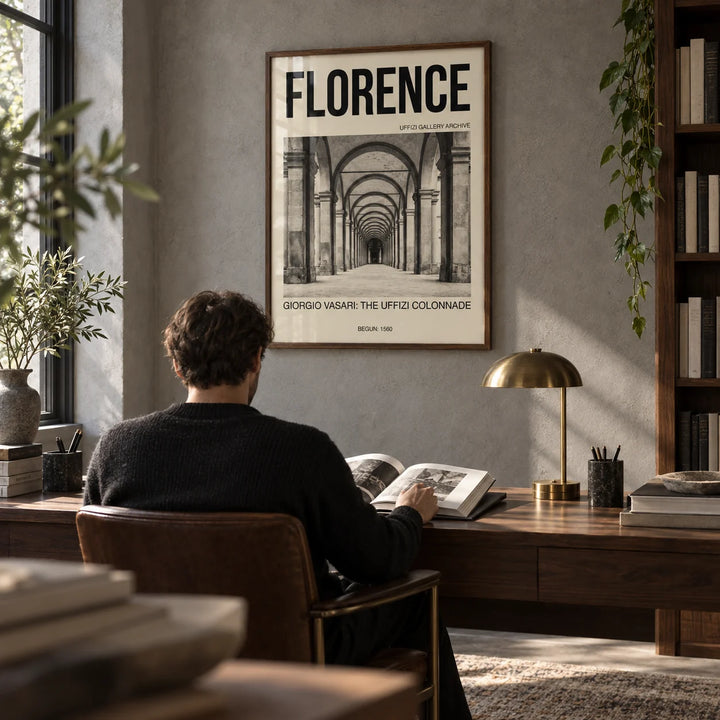 Florence Architecture Print, framed on the wall of a book-lined study with a stone grey wall
