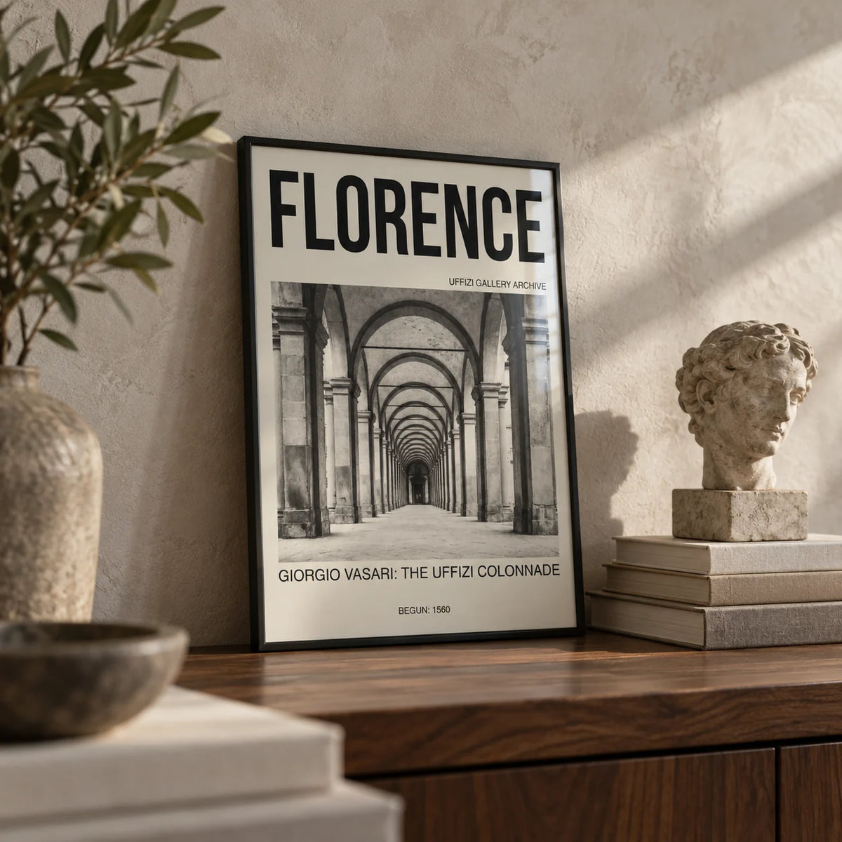 Florence Architecture Print, a small A4 framed print leaning on a walnut shelf in a living room