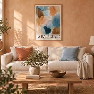 Flower Art for Walls, framed on the wall of a warm Mediterranean-style living room with a soft peach limewashed wall and a terracotta floor