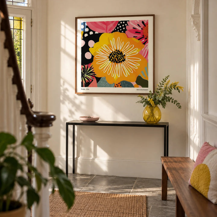 Flower Posters, framed on the wall of a bright entrance hallway in a Victorian UK terrace with a warm white wall and plain grey stone floor