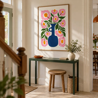 Flower Vase Print, framed on the wall of a welcoming hallway in a renovated UK terrace with warm white plaster walls and a plain pale stone floor