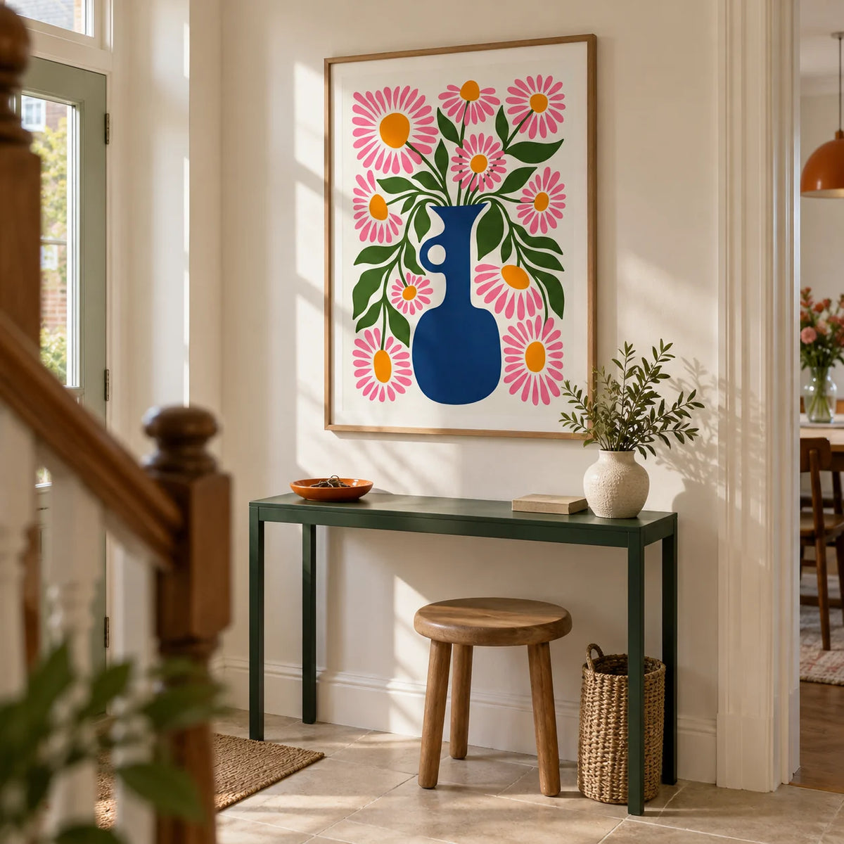 Flower Vase Print, framed on the wall of a welcoming hallway in a renovated UK terrace with warm white plaster walls and a plain pale stone floor