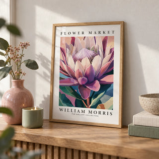 Flower Wall Art, a small A4 framed print leaning on an oak shelf in a living room