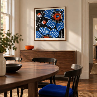 Flowers Prints, framed on the wall of a contemporary dining room in a Victorian terrace with warm white walls and a walnut floor