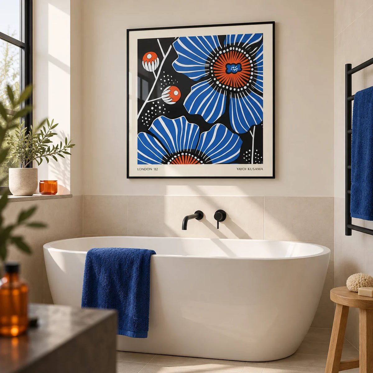 Flowers Prints, framed on the wall of a modern bathroom in a renovated UK terrace with an ivory painted wall and large plain ivory tiles