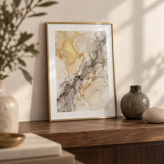 Fluid Art Gold Poster, a small A4 framed print leaning on a walnut shelf in a living room