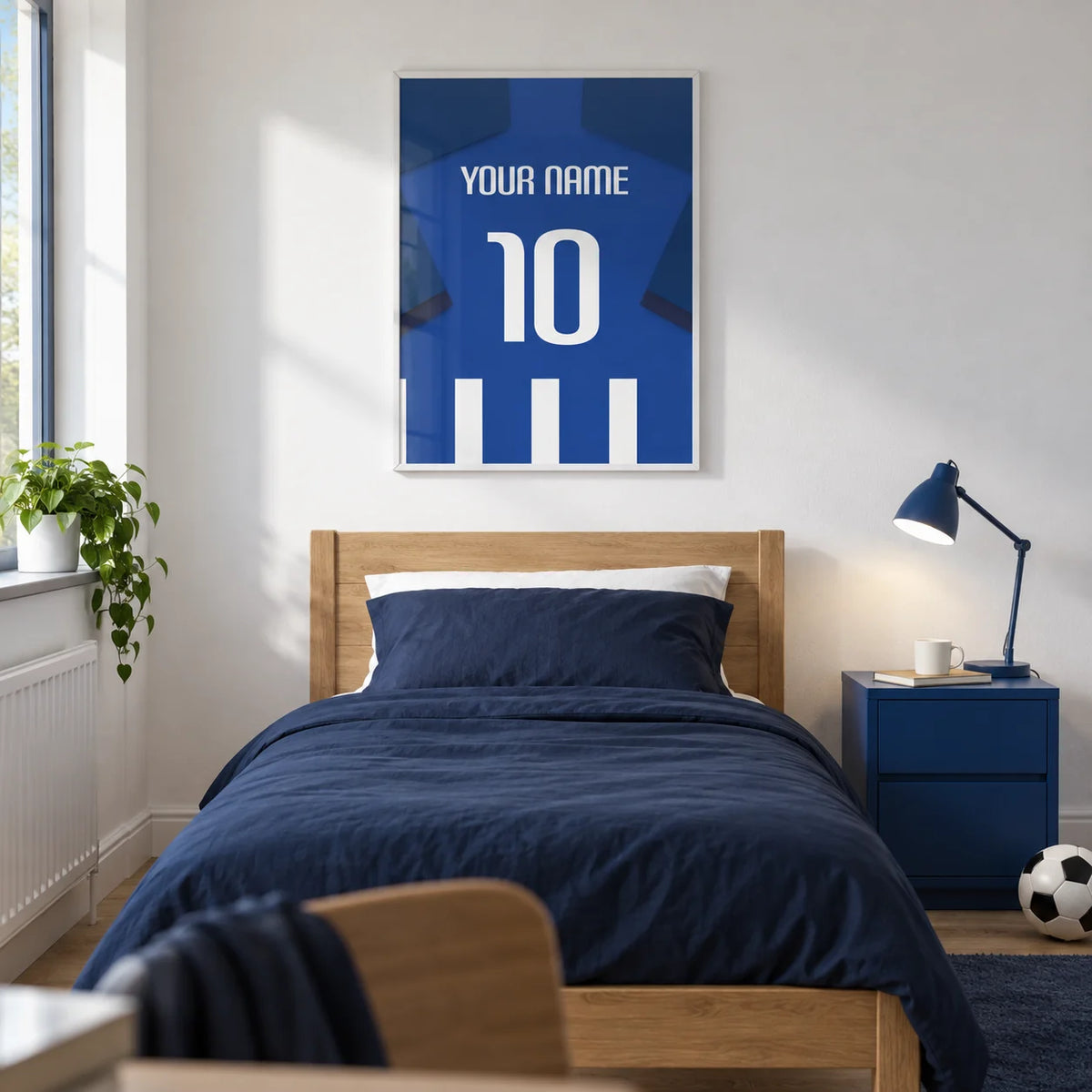 Football Shirt Poster in Blue and White Stripes with Dark Blue Sleeves, framed on the wall of a modern teenage football fan’s single bedroom (13-17) in a UK family home with a white wall and pale oak floor