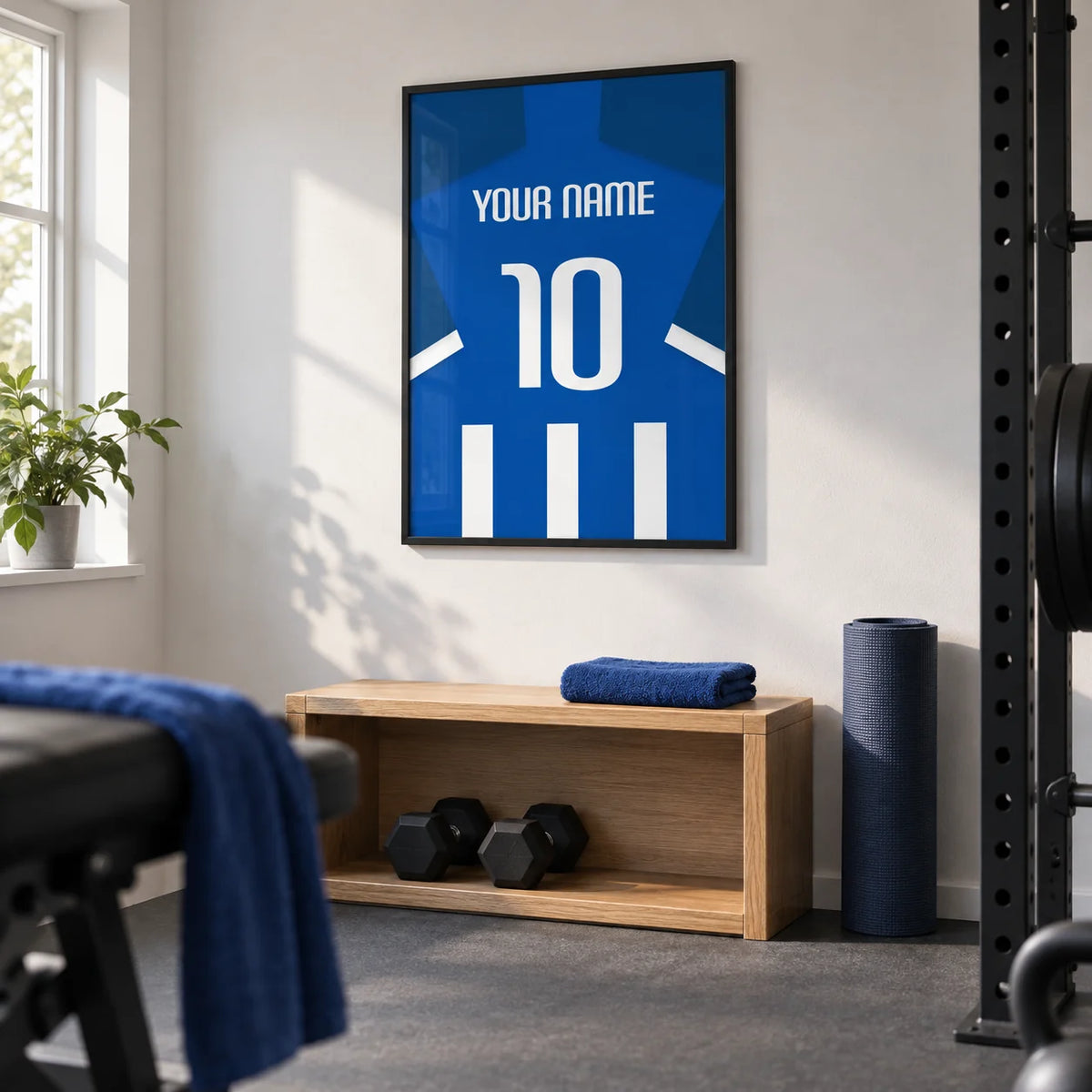 Football Shirt Poster in Blue and White Stripes with White Number, framed on the wall of a small converted spare-room home gym in a UK house with a white wall and plain grey rubber floor