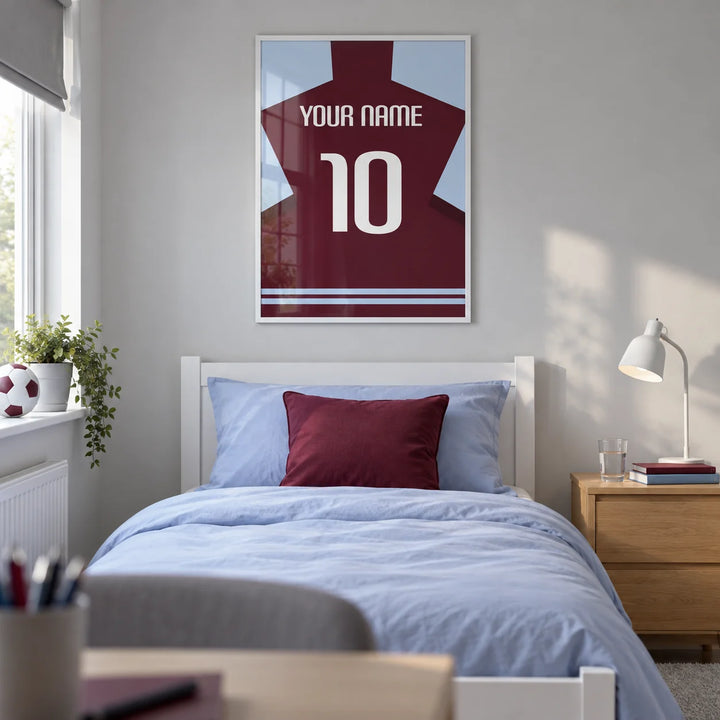 Football Shirt Poster in Claret with Light Blue Sleeves, framed on the wall of a modern football-loving teen bedroom (13-17) in a UK family home with a pale grey wall
