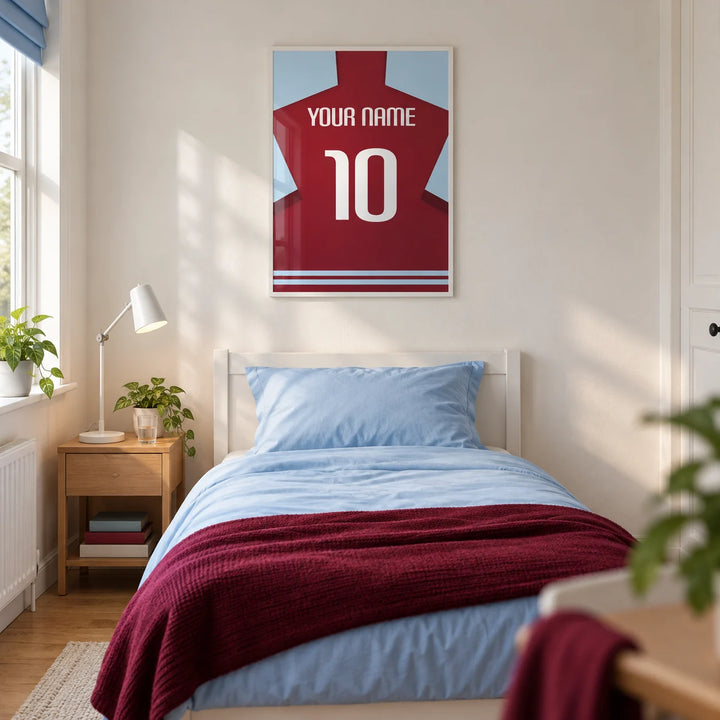 Football Shirt Poster in Plain Claret with White Number, framed on the wall of a modern football-loving teenager's single bedroom (13-17) in a UK family home with a warm white wall and oak floor