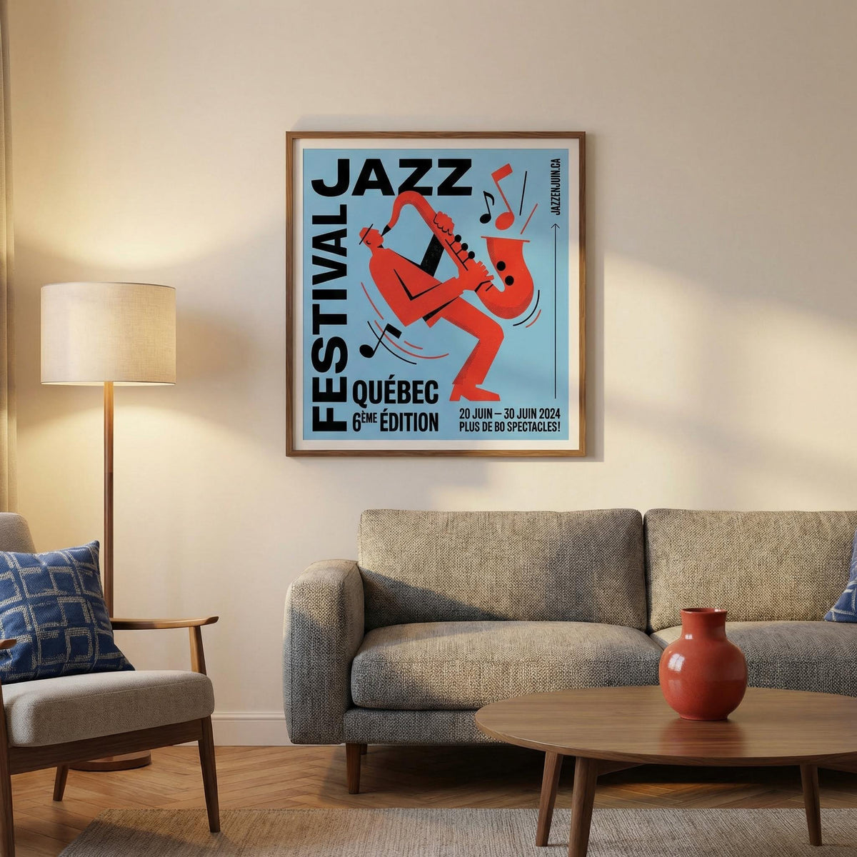 Living room with a gray sofa, lamp, and coffee table featuring a framed jazz festival poster on the wall.
