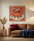 Living room with a brown leather sofa, decorative pillow, and framed jazz poster on the wall.