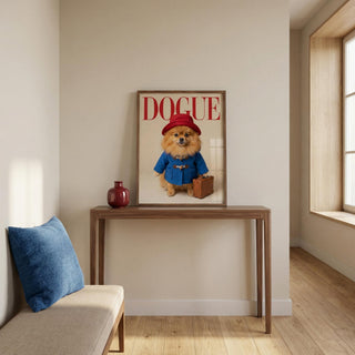 Room interior with a console table, blue cushion, and framed picture of a dog in a coat.