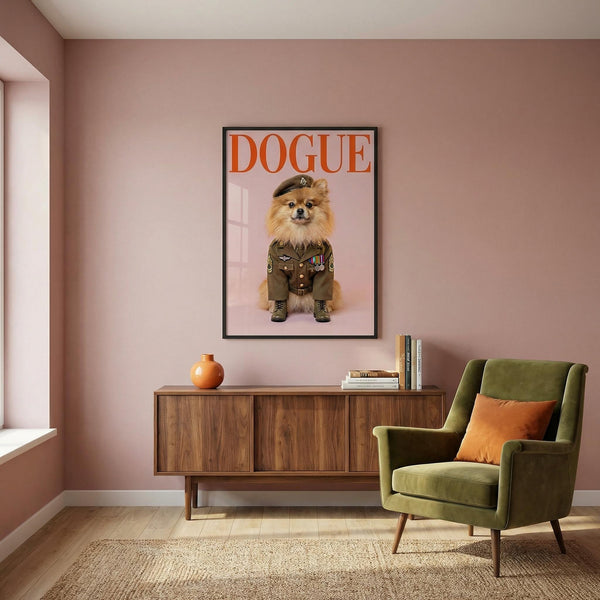Living room with a green armchair, wooden sideboard, and framed poster of a dog.